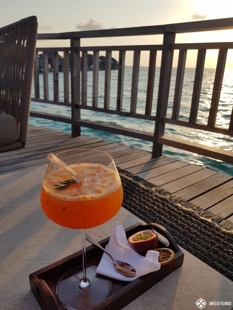 Enjoying a passion fruit cocktail at the Jing bar of Constance Halaveli