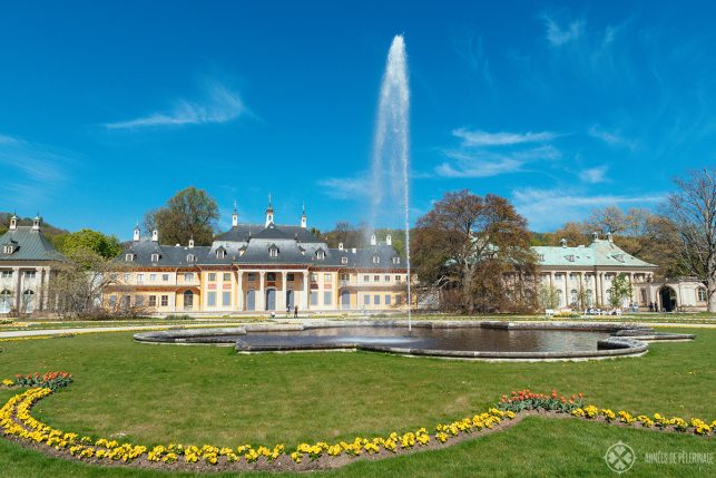 The Bergpalais with the grand fountain of Pillnitz castle in the foreground. Such a beautiful day trip from Dresden, Germany