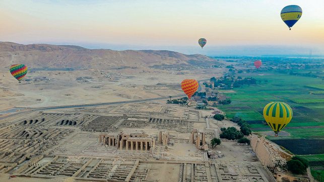 Hot air balloons over the Ramesseum in Luxor, Egypt