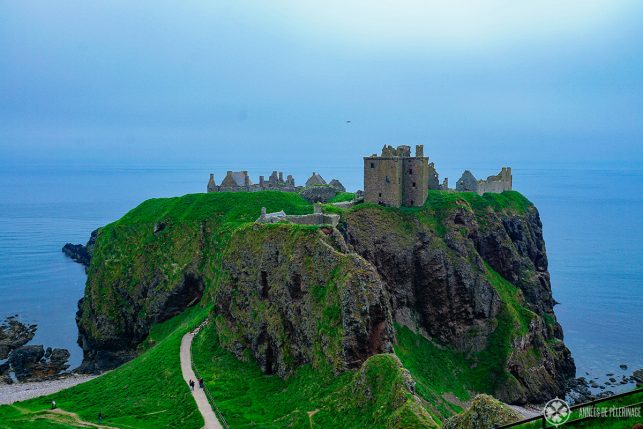 The eerie Dunnottar castle near Aberdeen, Scotland, on a foggy day