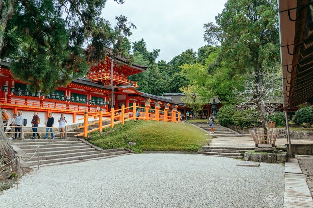 The entrance to the main hall of Kasuga Taisha with a rock garden in the foreground