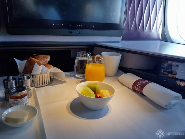 A continental breakfast with a fruit salad - my Qatar Airways review concludes that food is a hit or miss