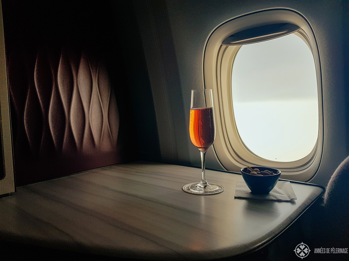 a champange in business class