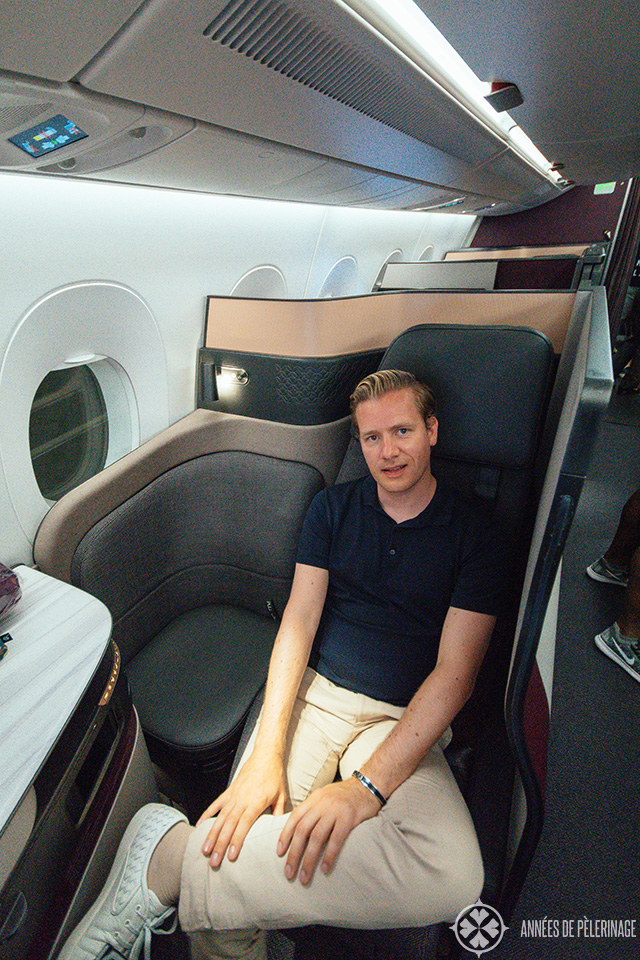 Me inside the QSuites business class by Qatar Airways