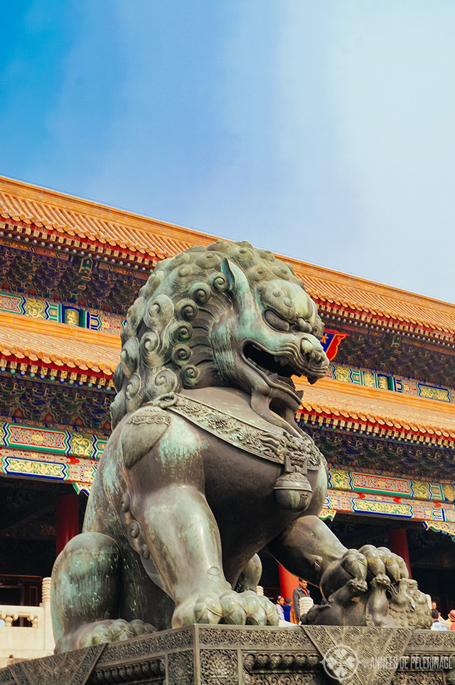 Monumental bronze lions before the Gate of supreme Harmony in the forbidden City Beijing