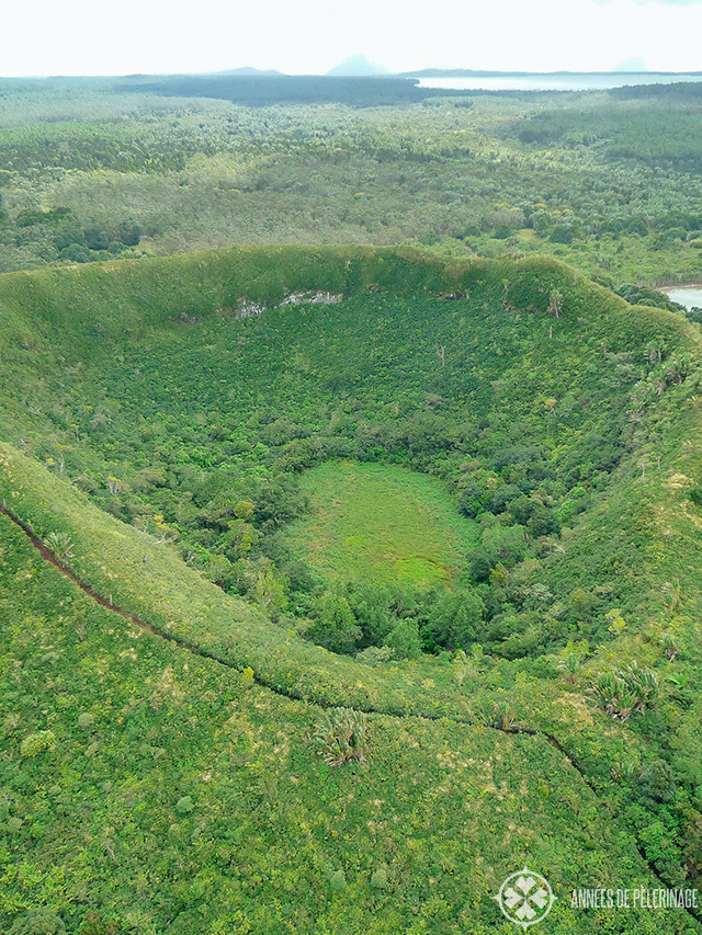 inactive volcano crater covered in dense shrubery in mauritius