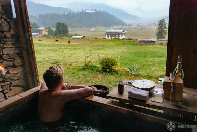 Me enjoying a traditional hot stone bath at Amankora Gangtey