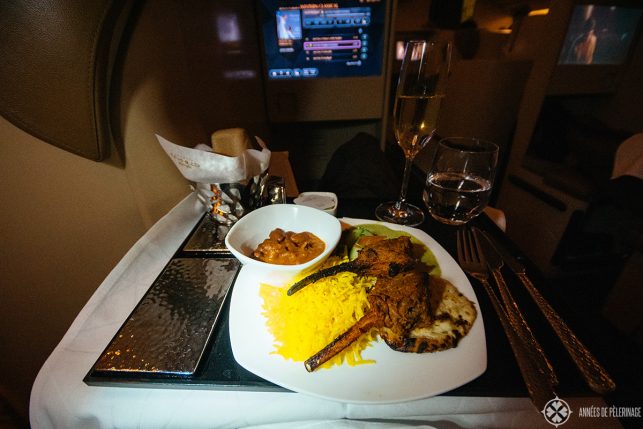 The Indian meal with lamb chops and champagne on Etihad business class