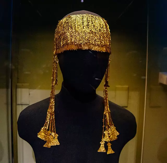 The famous golden headpiece of the Priam treasure inside the museum