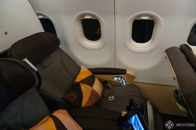 The seat in the reclined position on the short distance business class of Etihad airways