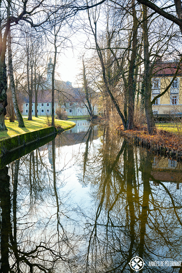 A water channel flowing around fürstenfeld abbey near munich