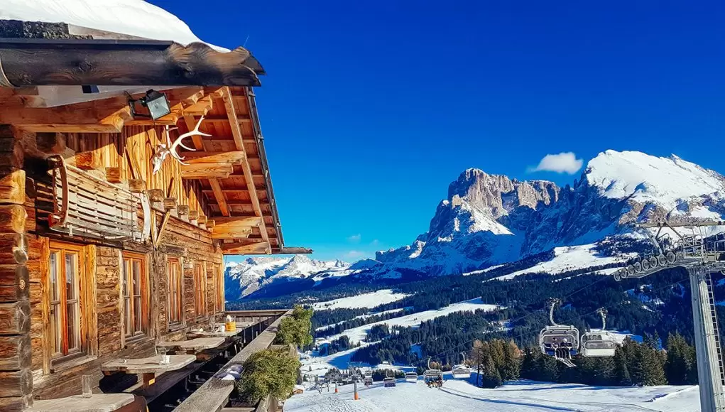 An epic lunch spot at the Seisser Alm in the Italian Dolomites in Winter