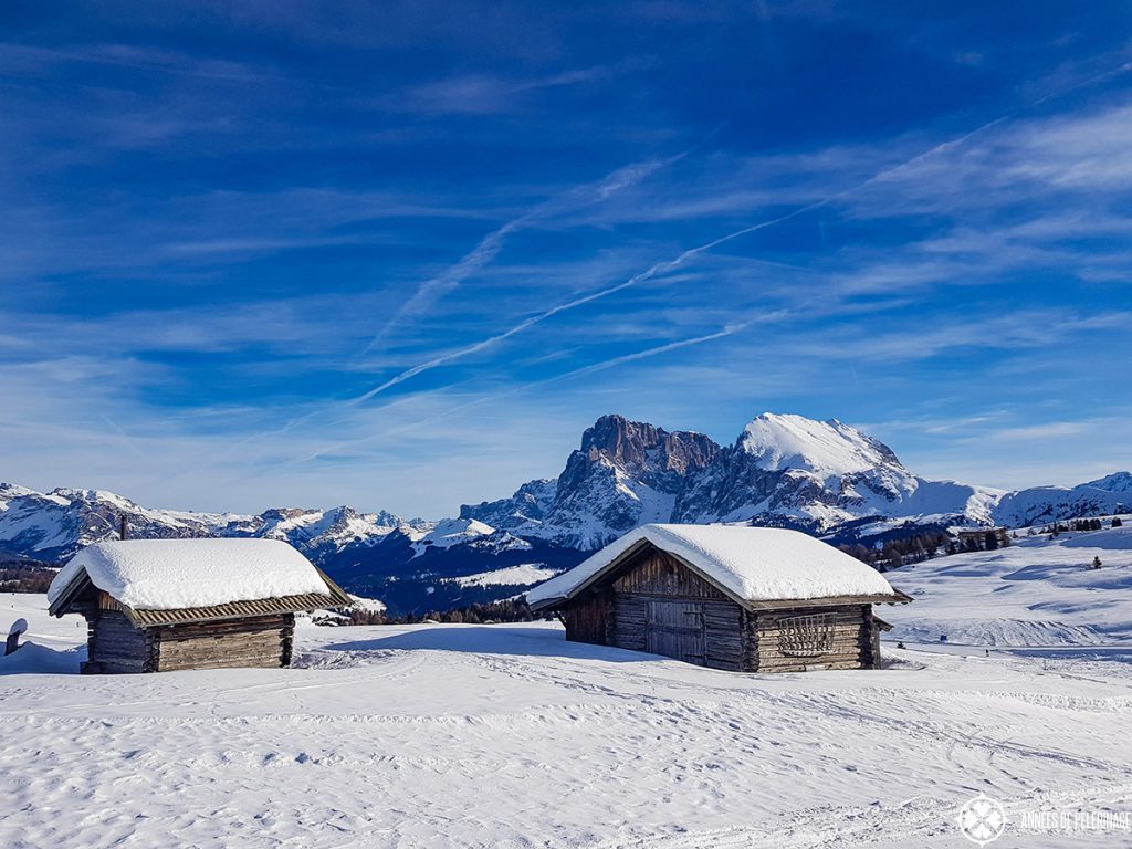 Typical small huts on the plateau of the Alpe di Siusi in the Italian Dolomites in Winter