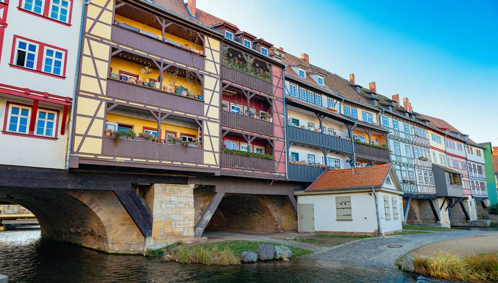 THe fantastic krämerbrücke with colorful half-timbered houses lining the lenght of the bridge in Erfurt