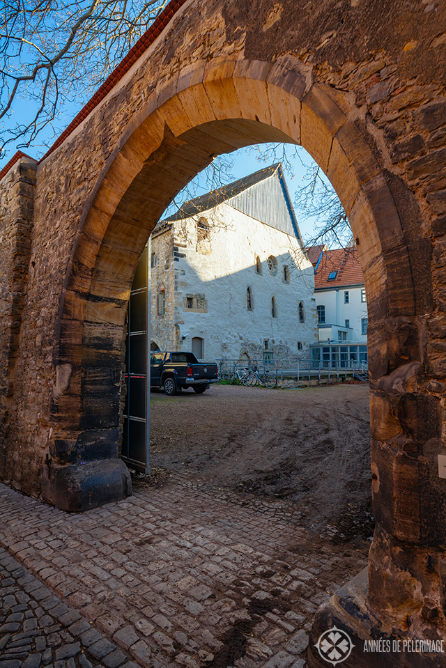 Erfurt's old synagogue as seen through a stone gate