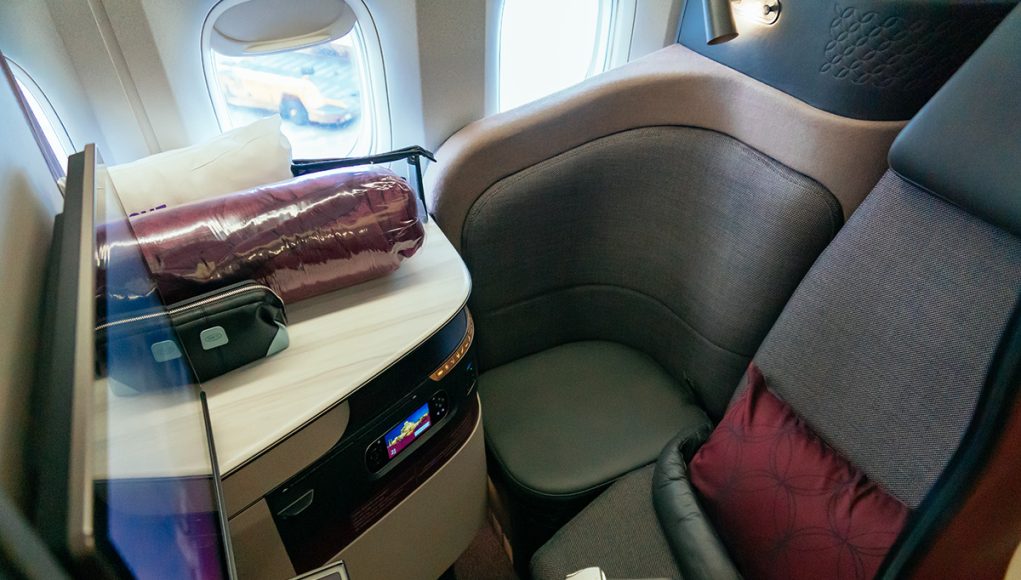 a business class seat of Qatar airways