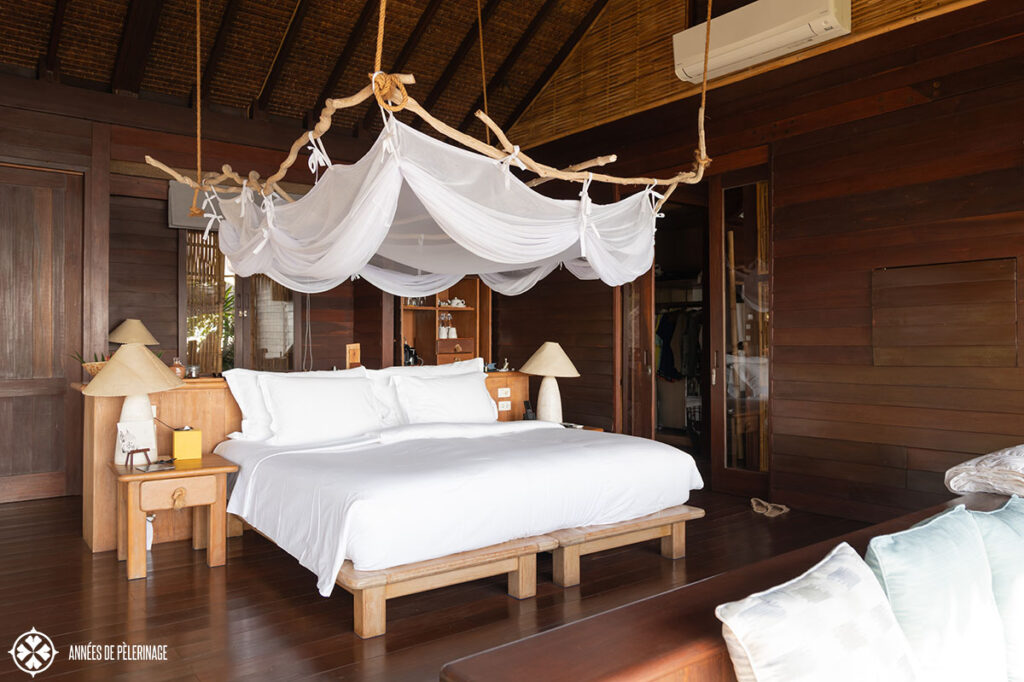 the masterbed room in a beach villa at six senses koh yao noi