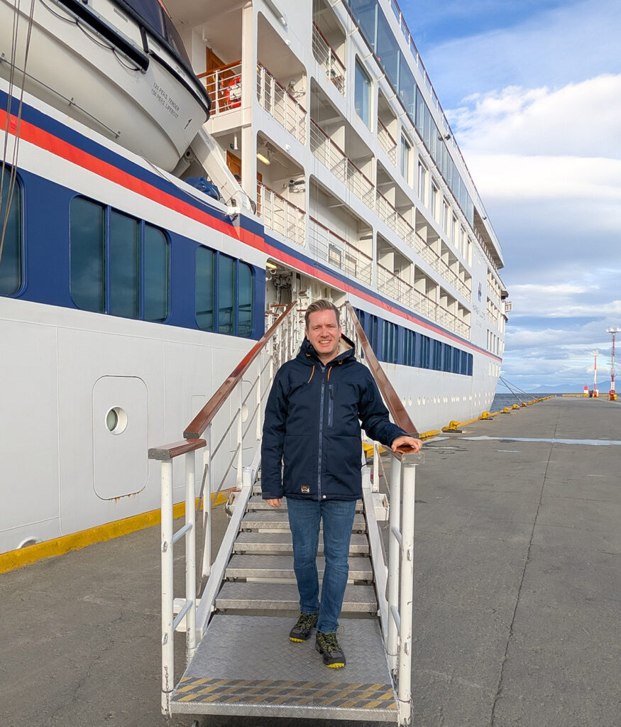 me wearing normal jeans on my way to explore the city of Ushuaia as part of our Antarctica cruise